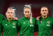 11 October 2022; Republic of Ireland players, from left, Denise O'Sullivan, Lily Agg and Áine O'Gorman stand for the playing of the National Anthem before the FIFA Women's World Cup 2023 Play-off match between Scotland and Republic of Ireland at Hampden Park in Glasgow, Scotland. Photo by Stephen McCarthy/Sportsfile