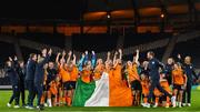 11 October 2022; Republic of Ireland players and staff celebrate with video analyst Andrew Holt after the FIFA Women's World Cup 2023 Play-off match between Scotland and Republic of Ireland at Hampden Park in Glasgow, Scotland. Photo by Stephen McCarthy/Sportsfile