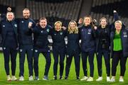 11 October 2022; Republic of Ireland staff, from left, StatSports technician Niamh McDaid, video analyst Andrew Holt, assistant manager Tom Elms, manager Vera Pauw, kit and equipment manager Orla Haran, masseuse Hannah Tobin Jones, digital media coordinator Emma Clinton and Evelyn McMullan, team operations, celebrate following the FIFA Women's World Cup 2023 Play-off match between Scotland and Republic of Ireland at Hampden Park in Glasgow, Scotland. Photo by Stephen McCarthy/Sportsfile