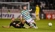 13 October 2022; Jack Byrne of Shamrock Rovers is fouled by Benjamin Hansen of Molde during the UEFA Europa Conference League group F match between Shamrock Rovers and Molde at Tallaght Stadium in Dublin. Photo by Seb Daly/Sportsfile