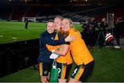 11 October 2022; Republic of Ireland players, from left, Harriet Scott, Amber Barrett and Louise Quinn celebrate after the FIFA Women's World Cup 2023 Play-off match between Scotland and Republic of Ireland at Hampden Park in Glasgow, Scotland. Photo by Stephen McCarthy/Sportsfile