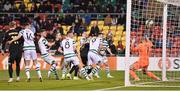 13 October 2022; Kristian Eriksen of Molde, hidden, scores his side's second goal during the UEFA Europa Conference League group F match between Shamrock Rovers and Molde at Tallaght Stadium in Dublin. Photo by Seb Daly/Sportsfile