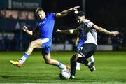 14 October 2022; Joe Adams of Dundalk in action against Gary Boylan of Finn Harps during the SSE Airtricity League Premier Division match between Finn Harps and Dundalk at Finn Park in Ballybofey, Donegal. Photo by Ben McShane/Sportsfile