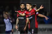 14 October 2022; Declan McDaid of Bohemians, left, and teammate Max Murphy, 12, in conversation during the SSE Airtricity League Premier Division match between St Patrick's Athletic and Bohemians at Richmond Park in Dublin. Photo by Seb Daly/Sportsfile