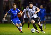 14 October 2022; Sam Bone of Dundalk in action against Ryan Connolly of Finn Harps during the SSE Airtricity League Premier Division match between Finn Harps and Dundalk at Finn Park in Ballybofey, Donegal. Photo by Ben McShane/Sportsfile
