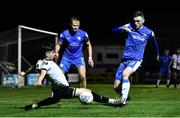 14 October 2022; Ryan O'Kane of Dundalk in action against Ryan Rainey of Finn Harps during the SSE Airtricity League Premier Division match between Finn Harps and Dundalk at Finn Park in Ballybofey, Donegal. Photo by Ben McShane/Sportsfile