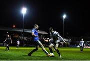 14 October 2022; Darragh Leahy of Dundalk in action against Gary Boylan of Finn Harps during the SSE Airtricity League Premier Division match between Finn Harps and Dundalk at Finn Park in Ballybofey, Donegal. Photo by Ben McShane/Sportsfile