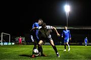 14 October 2022; John Martin of Dundalk in action against Harry Nicolson of Finn Harps during the SSE Airtricity League Premier Division match between Finn Harps and Dundalk at Finn Park in Ballybofey, Donegal. Photo by Ben McShane/Sportsfile
