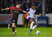 14 October 2022; Tunde Owolabi of St Patrick's Athletic in action against James Clarke of Bohemians during the SSE Airtricity League Premier Division match between St Patrick's Athletic and Bohemians at Richmond Park in Dublin. Photo by Seb Daly/Sportsfile