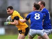 15 October 2022; Conor O'Donnell Snr of St Eunan's in action against Ciaran Thompson, 8, and Eoin Waide of Naomh Conaill during the Donegal County Senior Club Football Championship Final between Naomh Conaill and St Eunan's at Páirc Sheáin Mhic Cumhaill in Ballybofey, Donegal. Photo by Piaras Ó Mídheach/Sportsfile