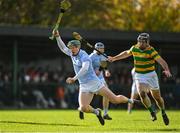 15 October 2022; William O’Donoghue of Na Piarsaigh in action against Michael Keane of South Liberties during the Limerick County Senior Club Hurling Championship Semi-Final match between Na Piarsaigh and South Liberties at John Fitzgerald Park in Kilmallock, Limerick. Photo by Seb Daly/Sportsfile