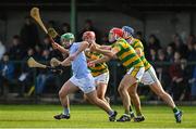 15 October 2022; Emmet McEvoy of Na Piarsaigh in action against Barry Nash, behind, and Brian Garry of South Liberties, second from right, during the Limerick County Senior Club Hurling Championship Semi-Final match between Na Piarsaigh and South Liberties at John Fitzgerald Park in Kilmallock, Limerick. Photo by Seb Daly/Sportsfile