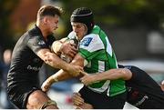 15 October 2022; Seán O'Brien of Naas is tackled by Tom Mulcair, left, and Darragh O'Callaghan of Old Belvedere during the Energia All-Ireland League Division 1B match between Old Belvedere and Naas RFC at Old Belvedere RFC in Dublin. Photo by Sam Barnes/Sportsfile