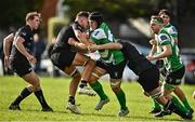 15 October 2022; Seán O'Brien of Naas is tackled by Tom Mulcair, left, and Darragh O'Callaghan of Old Belvedere during the Energia All-Ireland League Division 1B match between Old Belvedere and Naas RFC at Old Belvedere RFC in Dublin. Photo by Sam Barnes/Sportsfile