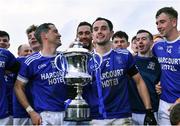 15 October 2022; Naomh Conaill captain Kevin McGettigan celebrates with the cup after his side's victory in the Donegal County Senior Club Football Championship Final between Naomh Conaill and St Eunan's at Páirc Sheáin Mhic Cumhaill in Ballybofey, Donegal. Photo by Piaras Ó Mídheach/Sportsfile