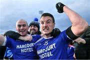 15 October 2022; Naomh Conaill players Leo McLoone, 15, and Dermot Molloy, left, celebrate after their side's victory in the Donegal County Senior Club Football Championship Final between Naomh Conaill and St Eunan's at Páirc Sheáin Mhic Cumhaill in Ballybofey, Donegal. Photo by Piaras Ó Mídheach/Sportsfile