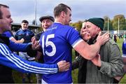 15 October 2022; Leo McLoone of Naomh Conaill celebrates with supporters after his side's victory in the Donegal County Senior Club Football Championship Final between Naomh Conaill and St Eunan's at Páirc Sheáin Mhic Cumhaill in Ballybofey, Donegal. Photo by Piaras Ó Mídheach/Sportsfile