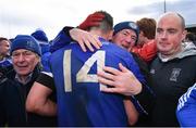15 October 2022; Supporters celebrate with Charles McGuinness of Naomh Conaill after their side's victory in the Donegal County Senior Club Football Championship Final between Naomh Conaill and St Eunan's at Páirc Sheáin Mhic Cumhaill in Ballybofey, Donegal. Photo by Piaras Ó Mídheach/Sportsfile