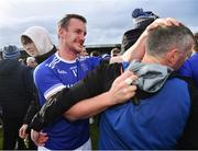 15 October 2022; Leo McLoone of Naomh Conaill celebrates with supporters after his side's victory in the Donegal County Senior Club Football Championship Final between Naomh Conaill and St Eunan's at Páirc Sheáin Mhic Cumhaill in Ballybofey, Donegal. Photo by Piaras Ó Mídheach/Sportsfile