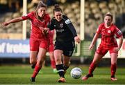 15 October 2022; Ciara Rossiter of Wexford Youths in action against Sarah Kiernan of Sligo Rovers during the SSE Airtricity Women's National League match between Wexford Youths and Sligo Rovers at Ferrycarrig Park in Wexford. Photo by Eóin Noonan/Sportsfile