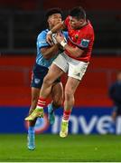 15 October 2022; Kurt-Lee Arendse of Vodacom Bulls and Calvin Nash of Munster contest a garryowen kick during the United Rugby Championship match between Munster and Vodacom Bulls at Thomond Park in Limerick. Photo by Brendan Moran/Sportsfile