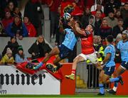 15 October 2022; Kurt-Lee Arendse of Vodacom Bulls and Calvin Nash of Munster contest a garryowen kick during the United Rugby Championship match between Munster and Vodacom Bulls at Thomond Park in Limerick. Photo by Brendan Moran/Sportsfile