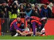 15 October 2022; Calvin Nash of Munster receives treatment before being substituted during the United Rugby Championship match between Munster and Vodacom Bulls at Thomond Park in Limerick. Photo by Harry Murphy/Sportsfile
