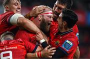15 October 2022; Jeremy Loughman of Munster celebrates with team-mates Gavin Coombes, Craig Casey, Jean Kleyn and Joey Carbery after scoring their side's third try during the United Rugby Championship match between Munster and Vodacom Bulls at Thomond Park in Limerick. Photo by Brendan Moran/Sportsfile
