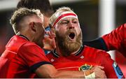 15 October 2022; Jeremy Loughman of Munster celebrates with team-mate Craig Casey after scoring their side's third try during the United Rugby Championship match between Munster and Vodacom Bulls at Thomond Park in Limerick. Photo by Brendan Moran/Sportsfile