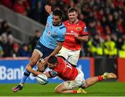 15 October 2022; Harold Vorster of Vodacom Bulls is tackled by Dan Goggin of Munster during the United Rugby Championship match between Munster and Vodacom Bulls at Thomond Park in Limerick. Photo by Harry Murphy/Sportsfile
