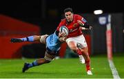 15 October 2022; Joey Carbery of Munster beats the tackle of WJ Steenkamp of Vodacom Bulls on the way to setting up his side's third try during the United Rugby Championship match between Munster and Vodacom Bulls at Thomond Park in Limerick. Photo by Brendan Moran/Sportsfile