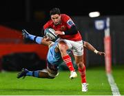 15 October 2022; Joey Carbery of Munster beats the tackle of WJ Steenkamp of Vodacom Bulls on the way to setting up his side's third try during the United Rugby Championship match between Munster and Vodacom Bulls at Thomond Park in Limerick. Photo by Brendan Moran/Sportsfile