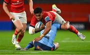15 October 2022; Malakai Fekitoa of Munster is tackled by Chris Smith of Vodacom Bulls during the United Rugby Championship match between Munster and Vodacom Bulls at Thomond Park in Limerick. Photo by Brendan Moran/Sportsfile