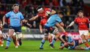 15 October 2022; Thomas Ahern of Munster is tackled by Elrigh Louw and Marcell Coetzee of Vodacom Bulls during the United Rugby Championship match between Munster and Vodacom Bulls at Thomond Park in Limerick. Photo by Brendan Moran/Sportsfile