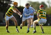 15 October 2022; Daithi Dempsey of Na Piarsaigh in action against David Garry, left, and Shane O’Neill of South Liberties during the Limerick County Senior Club Hurling Championship Semi-Final match between Na Piarsaigh and South Liberties at John Fitzgerald Park in Kilmallock, Limerick. Photo by Seb Daly/Sportsfile