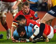 15 October 2022; WJ Steenkamp of Vodacom Bulls is tackled on the line by Conor Murray and Gavin Coombes of Munster during the United Rugby Championship match between Munster and Vodacom Bulls at Thomond Park in Limerick. Photo by Harry Murphy/Sportsfile