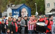 16 October 2022; Derry City supporters make their way to the stadium before the Extra.ie FAI Cup Semi-Final match between Derry City and Treaty United at the Ryan McBride Brandywell Stadium in Derry. Photo by Ramsey Cardy/Sportsfile