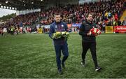 16 October 2022; Derry City manager Ruaidhrí Higgins, right, and Treaty United manager Tommy Barrett with wreaths to remember the lives lost and those injured in the Creeslough tragedy in Donegal, before the Extra.ie FAI Cup Semi-Final match between Derry City and Treaty United at the Ryan McBride Brandywell Stadium in Derry. Photo by Ramsey Cardy/Sportsfile