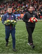 16 October 2022; Derry City manager Ruaidhrí Higgins, right, and Treaty United manager Tommy Barrett with wreaths to remember the lives lost and those injured in the Creeslough tragedy in Donegal, before the Extra.ie FAI Cup Semi-Final match between Derry City and Treaty United at the Ryan McBride Brandywell Stadium in Derry. Photo by Ramsey Cardy/Sportsfile