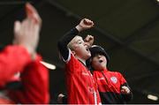 16 October 2022; Derry City supporters celebrate their side's second goal during the Extra.ie FAI Cup Semi-Final match between Derry City and Treaty United at the Ryan McBride Brandywell Stadium in Derry. Photo by Ramsey Cardy/Sportsfile