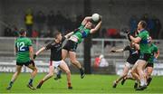 16 October 2022; Barry O'Sullivan of Dingle in action against Ronan Buckley of East Kerry during the Kerry County Senior Football Championship semi-final match between East Kerry and Dingle at Austin Stack Park in Tralee, Kerry. Photo by Brendan Moran/Sportsfile