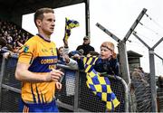 16 October 2022; A young Summerhill supporter tries to get a high five from Summerhill captain Padhraig Geraghty as he runs out before the Meath County Senior Football Championship Final between Ratoath and Summerhill at Páirc Tailteann in Navan, Meath. Photo by Harry Murphy/Sportsfile