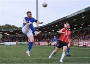 16 October 2022; Sean Guerins of Treaty United in action against Michael Duffy of Derry City during the Extra.ie FAI Cup Semi-Final match between Derry City and Treaty United at the Ryan McBride Brandywell Stadium in Derry. Photo by Ramsey Cardy/Sportsfile