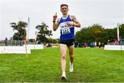 16 October 2022; Sean McGinley of Finn Valley AC, Donegal, celebrates on his way to winning the junior men's 6000m during the Autumn Open International Cross Country Festival at the Sport Ireland Campus in Dublin. Photo by Sam Barnes/Sportsfile
