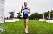16 October 2022; Sean McGinley of Finn Valley AC, Donegal, celebrates on his way to winning the junior men's 6000m during the Autumn Open International Cross Country Festival at the Sport Ireland Campus in Dublin. Photo by Sam Barnes/Sportsfile