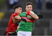 16 October 2022; Conor Brady of Gowna is tackled by Mattie McKenna of Killygarry during the Cavan County Senior Club Football Championship Final between Gowna and Killygarry at Kingspan Breffni in Cavan. Photo by Ben McShane/Sportsfile