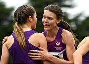 16 October 2022; Abbie Donnelly of England, centre, is congratulated by her Loughborough University team-mates, Grace Carson of Northern Ireland, right, and Alex Millard, left, after competing in the senior women's 6000m during the Autumn Open International Cross Country Festival at the Sport Ireland Campus in Dublin. Photo by Sam Barnes/Sportsfile