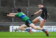 16 October 2022; James O'Donoghue of East Kerry has a shot on goal despite the best efforts of Mark O'Connor of Dingle during the Kerry County Senior Football Championship semi-final match between East Kerry and Dingle at Austin Stack Park in Tralee, Kerry. Photo by Brendan Moran/Sportsfile