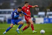 16 October 2022; Matty Smith of Shelbourne and Yassine En-Neyah of Waterford during the Extra.ie FAI Cup Semi-Final match between Waterford and Shelbourne at the RSC in Waterford. Photo by Seb Daly/Sportsfile