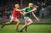 16 October 2022; Phelim O'Reilly of Kilmallock in action against Adam English of Doon during the Limerick County Senior Hurling Championship Semi-Final match between Kilmallock and Doon at Bruff GAA Club in Bruff, Limerick. Photo by Matt Browne/Sportsfile